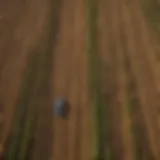 Aerial view of diverse agricultural fields showcasing crop rotation