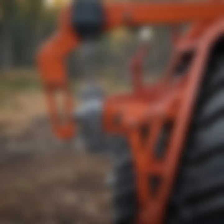 Close-up of front bucket attachment mechanism on a tractor.