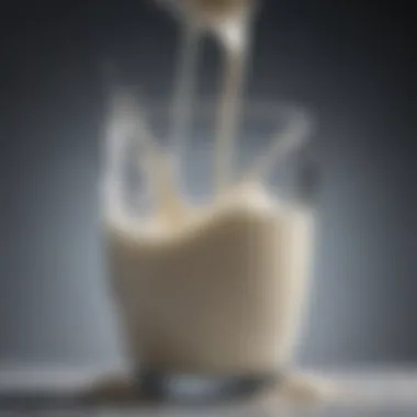 Pouring Whole Milk into a Glass Pouring whole milk into a glass