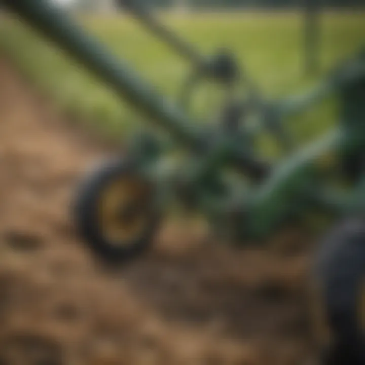 Close-up of the operational mechanisms of a Krone hay tedder